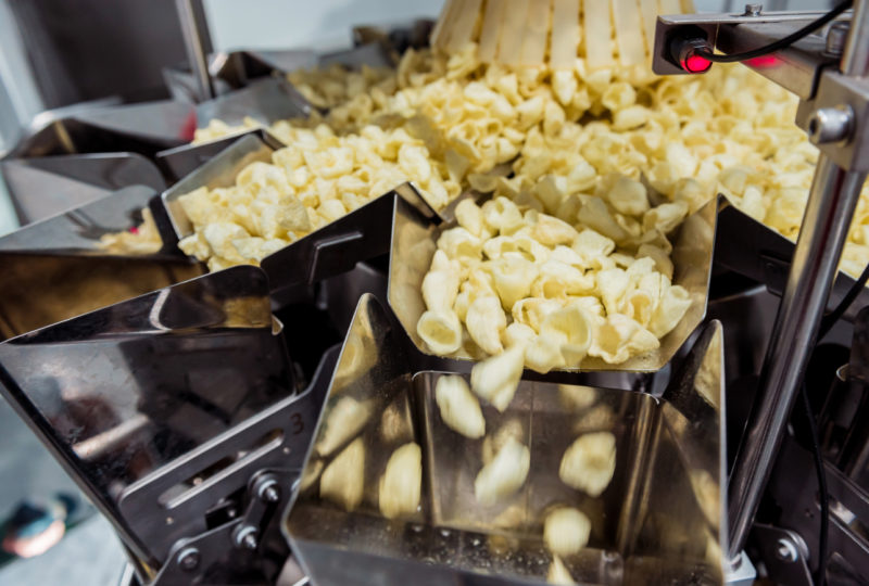 Multihead Weigher in operation, Our Solutions | High Dream